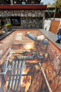 Im Outdoor-Bereich tut sich die Erde auf und du kannst einen waghalsigen Balanceakt auf Rohrleitungen vollbringen. - FemNews.de